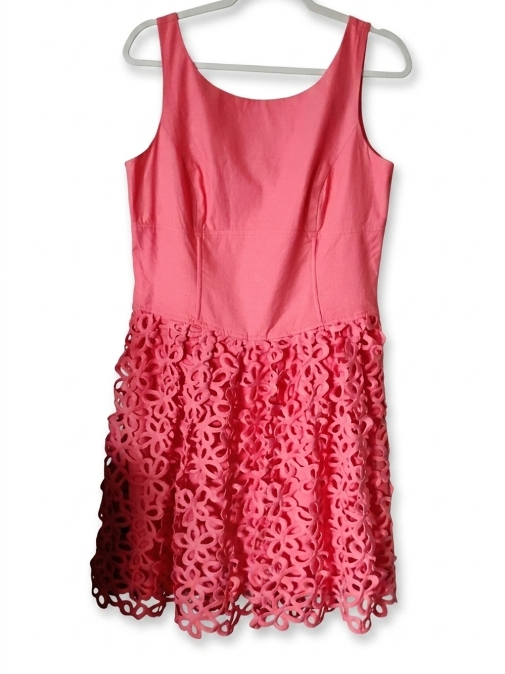 This is a coral-colored cocktail dress by Antonio Melani
